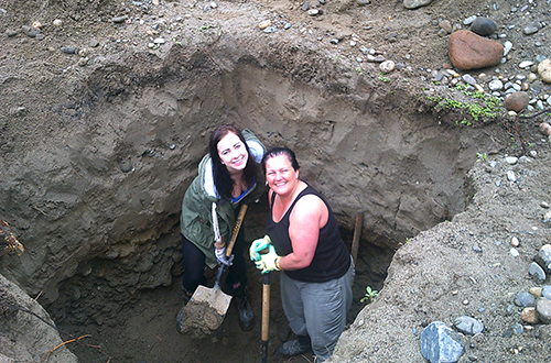 Nicola Barnes digging a hole