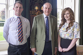 Sir Tom Cowie Memorial Scholarship winners Robin Watson and Alex Bowey are pictured with Chairman of Trustees of the Sir Tom Cowie Charitable Trust, David Gray, FRICS